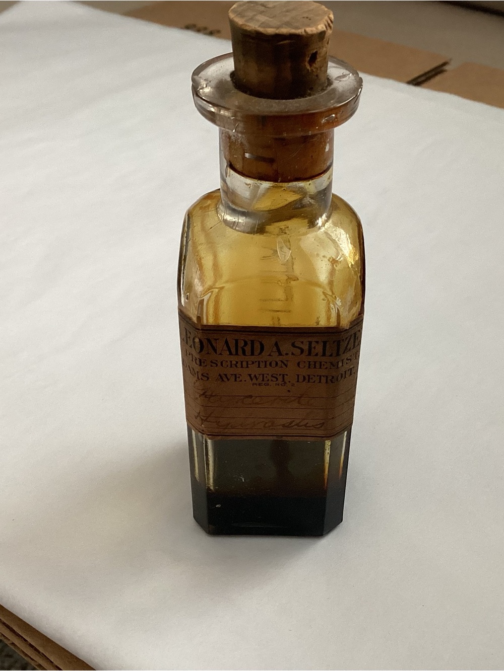 Antique Apothecary glass bottle early 20th Century.  “Spirit of Gaultheria”